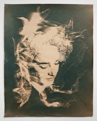 a photo of a woman with smoke coming out of her hair