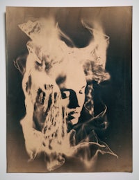 a photo of a woman with smoke coming out of her head