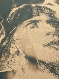 a black and white photograph of a woman's face