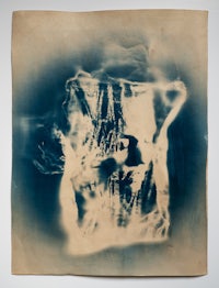 a blue and white photo of a man and a woman