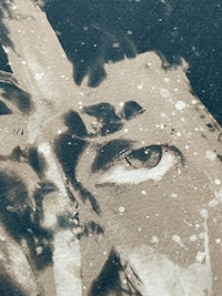 a black and white photo of a bird