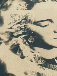 a black and white photo of a woman's face