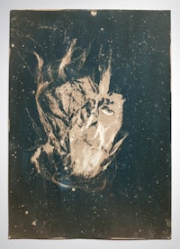 a black and white photo of a face with a star in the background